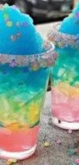 Colorful slushie drink with sprinkles in vibrant hues.