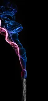 Vibrant matchstick with colorful swirling smoke on black background.