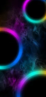 Vibrant wallpaper with neon circles and colorful smoke on a black background.