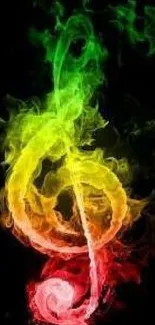 Vibrant smoke treble clef on black background with green, yellow, and red hues.