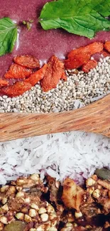 Colorful smoothie bowl on a rustic wood background with spoon.