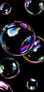 Colorful soap bubbles with vibrant reflections on a black background.