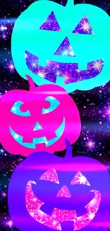 Neon pumpkins with cosmic patterns on a starry background in vibrant colors.