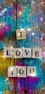 Colorful sparkly wallpaper with 'I Love You' wooden tiles.