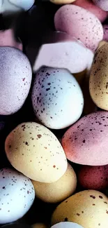 Colorful speckled eggs in pastel hues for mobile wallpaper.