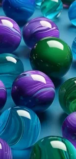 Colorful glossy spheres on a teal background.