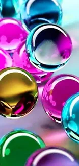 Vibrant mobile wallpaper with colorful glossy spheres.