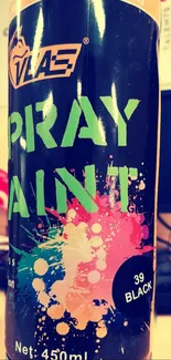 Colorful spray paint can with vibrant splashes.