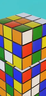 Colorful stacked cubes against sky blue background.