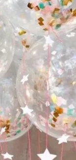 Transparent balloons with star confetti.