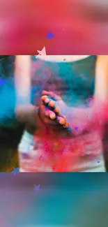 Hands with colorful powder and stars on vibrant background.