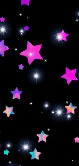 Colorful glowing stars on a black background wallpaper.