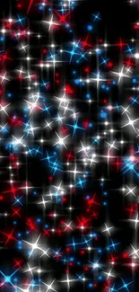 Vibrant starry night wallpaper with red, blue, and white stars.