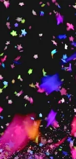 Colorful stars and confetti on a black night background.