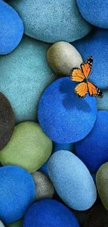 Colorful stones and a butterfly mobile wallpaper.