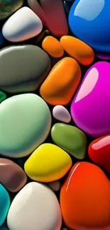 A vibrant mobile wallpaper featuring colorful smooth stones.