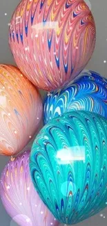 Vibrant 3D swirl pattern balloons against a neutral gray background.