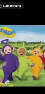 Teletubbies in a vibrant green field.