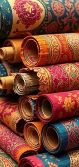 Colorful rolled textile patterns in vibrant hues.