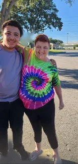 A joyful street scene with a colorful tie-dye shirt.