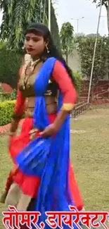 Colorful traditional dance in a lush garden setting.