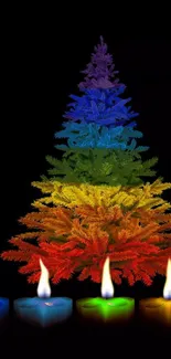 Rainbow-colored tree with glowing candles on black background.