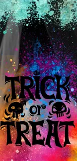 Colorful Halloween 'Trick or Treat' wallpaper with vibrant splashes and skulls.