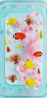 Colorful fish swimming among pink flowers in an aquarium setting.