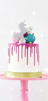 Whimsical unicorn cake on pink stand with colorful decorations.