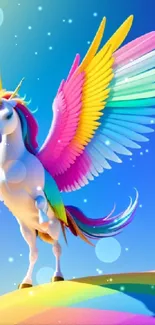 A colorful unicorn with multicolored wings standing on a rainbow hill under a blue sky.