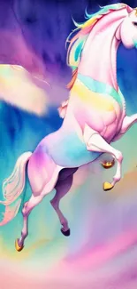 Colorful unicorn with wings on a vibrant fantasy background.