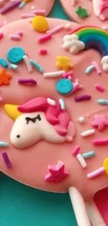 Colorful unicorn candy art with pink theme and rainbow details.