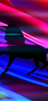 Silhouette of a unicorn with vibrant magenta and blue colors in the background.