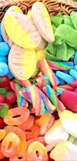 A wooden bowl filled with colorful vegan candies on a green background.