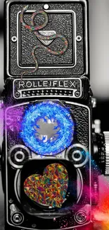 Vintage camera with colorful artistic splash design.