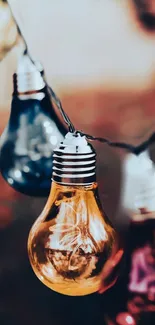 Colorful vintage light bulbs on a warm background.