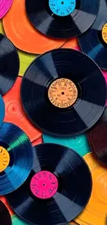 Colorful vinyl records overlapping pattern wallpaper.