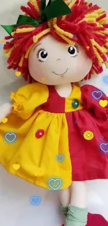 Colorful wool doll in bright attire with vibrant red hair.