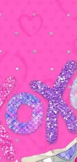 Playful pink XO design with sparkly gems and vibrant colors.