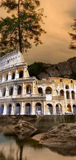 Colosseum surrounded by nature at sunset, perfect mobile wallpaper.