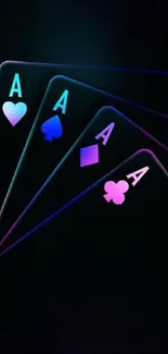 Neon playing cards with a dark background.