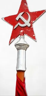 Red star with sickle and hammer symbol on a staff