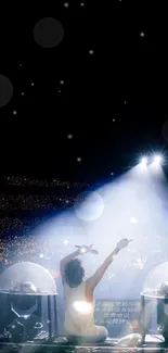 Dynamic concert scene with bright lights and a cheering crowd.