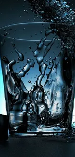 Cool liquid splash in glass with ice on dark blue background.