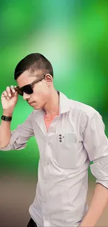 Stylish man in white shirt with green background.