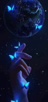 Hand reaches towards Earth with luminous blue butterflies in dark cosmic scene.