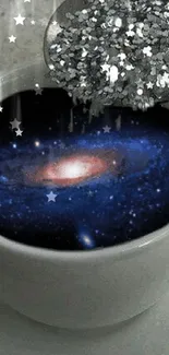 Galaxy-filled coffee cup with sparkling stars wallpaper.