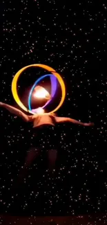 Dancer in neon rings on a starry background wallpaper.