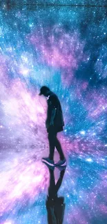 Person silhouette against a cosmic galaxy with purple and blue colors.