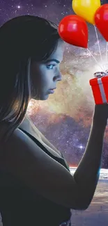 Woman holding gift with balloons in space-themed wallpaper.